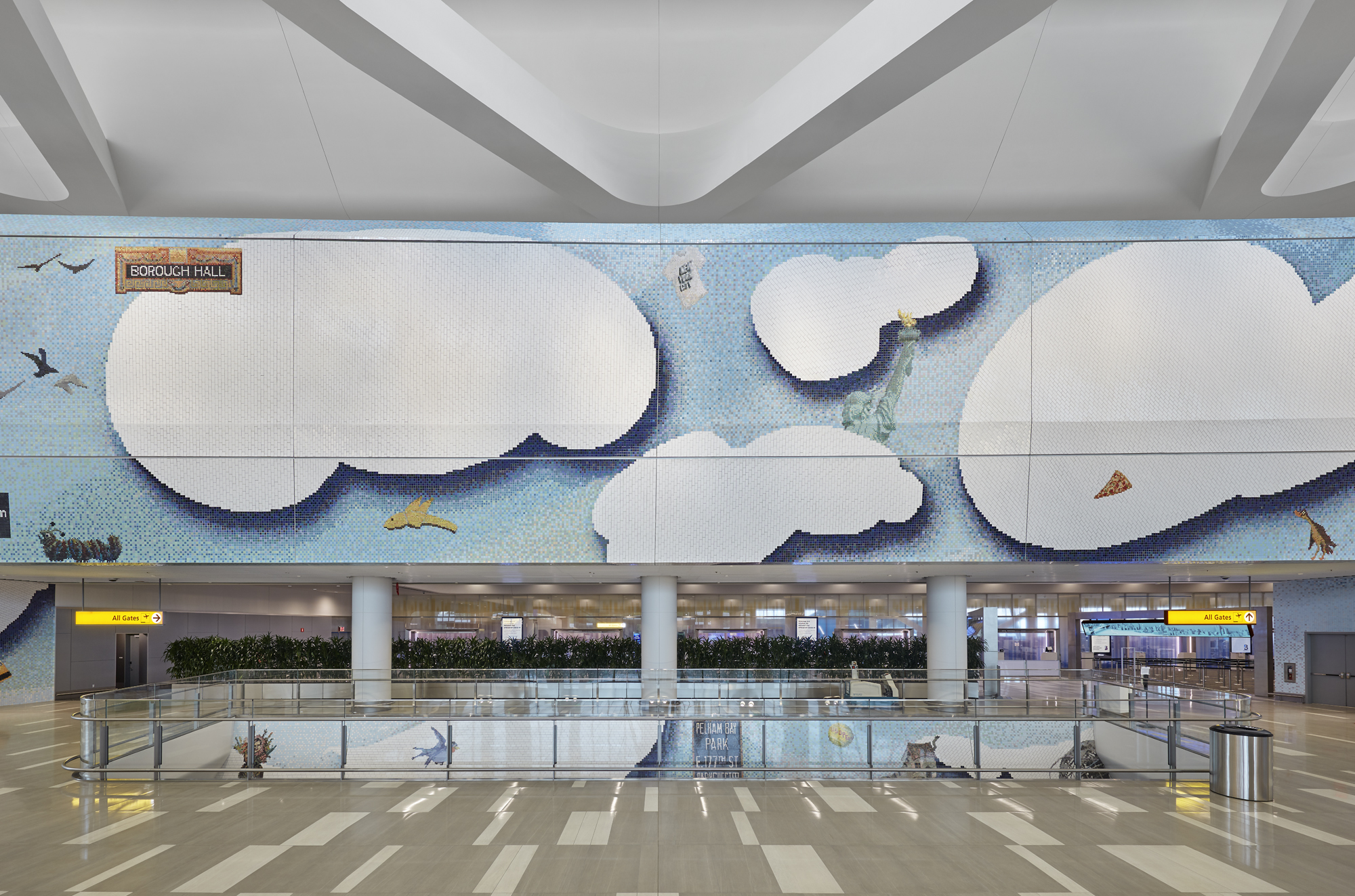 An expansive tiled mosaic featuring a light blue sky filled with illustrative clouds, along a floating bagel, the top of the Empire State Building, and an I Heart...